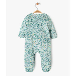 Pyjama en velours à motifs fleuris ouvert devant bébé fille